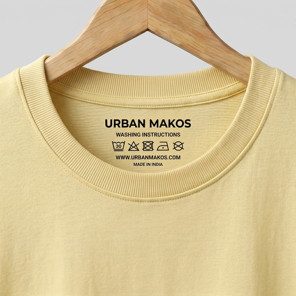 Urban Makos Butter Yellow oversized t-shirt neck detail