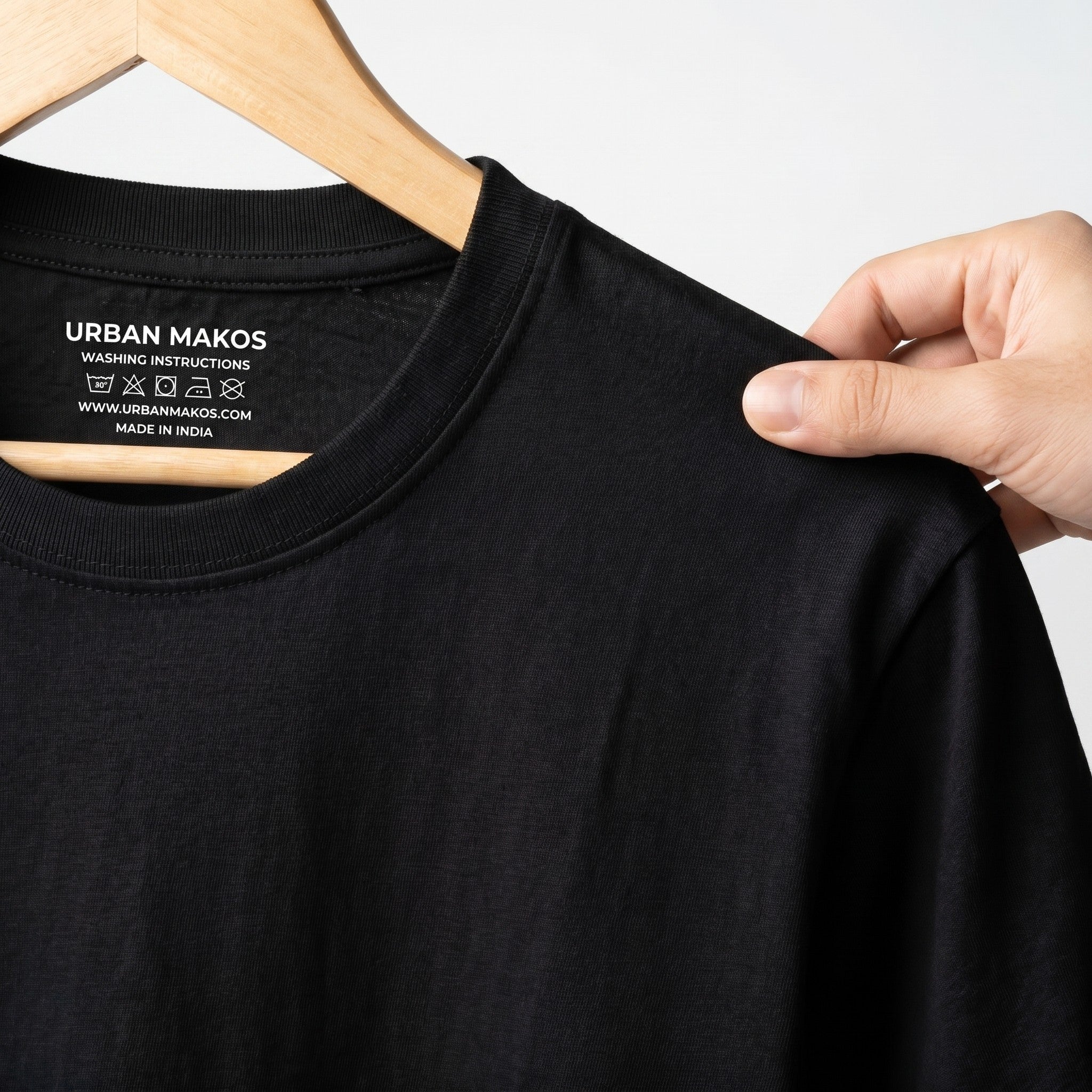 Urban Makos Black round neck fabric detail
